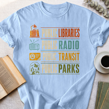 Public Libraries, Public Radio, Public Transit, Public Parks Tee — Light Blue